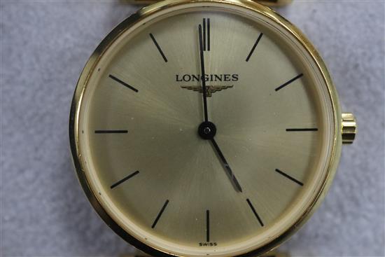 A ladys gold plated and stainless steel La Grande Classique de Longines quartz wrist watch, with box and guarantee.